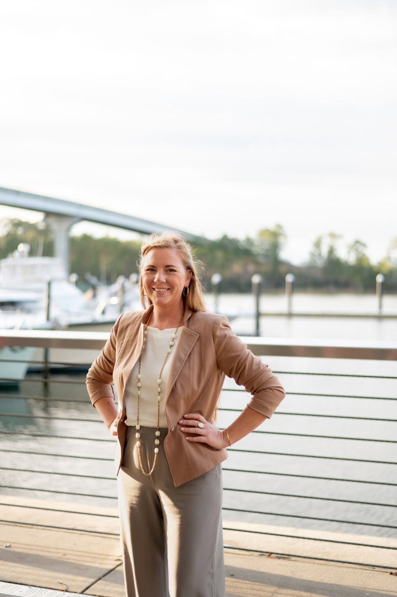 Portrait of Lillian, founder of Baldwin County Resources, on the waterfront.
